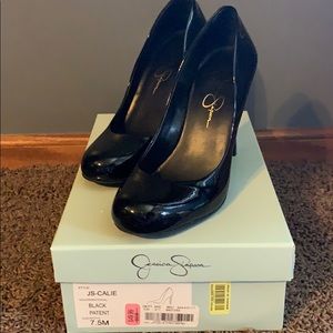 Black patent leather pumps